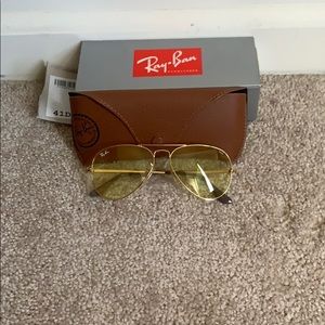 Women’s yellow tinted Ray-Ban aviator sunglasses